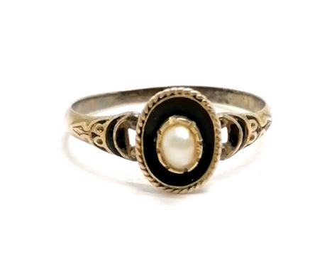 Antique mourning ring in unmarked gold with blue enamel detail and cut pearls to centre in original ring - size Q½ &amp; 1.6 