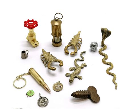 Terrys Hedgehog pipe reamer, Calvin Hill gas valve cigarette lighter, miniature miners lamp (total height 8.5cm), brass cobra