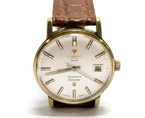 Tissot automatic seastar wristwatch gents wristwatch - 32mm case and has a gold plated head with a stainless steel back ~ run