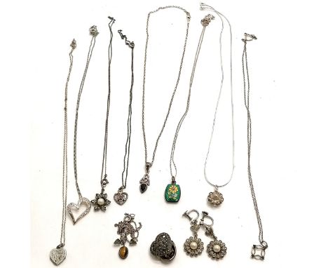 Qty of silver necklaces with pendants inc garnet set, enamel etc t/w 2 pairs of unmarked marcasite earrings - total weight 48