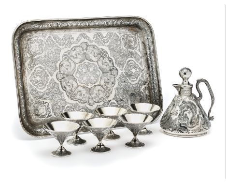 AN IRANI LIQUEUR SET AND TRAY, RASOOL PARVARESH, ISFAHAN, CIRCA 1960 comprising a conical flask and stopper chased and engrav