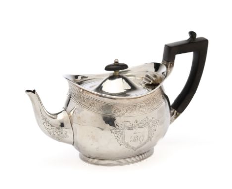 A VICTORIAN SILVER TEAPOT, WILLIAM HUTTON &amp; SONS LTD., LONDON, 1900 oval, engraved to one side with the crest and motto o