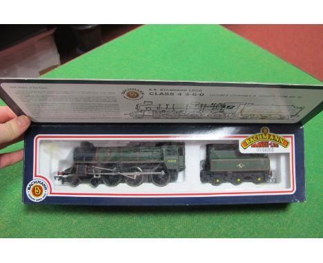 A 'OO' Scale Bachmann No 31-101, 4-6-0 standard 4MT locomotive and tender, in BR green, boxed.