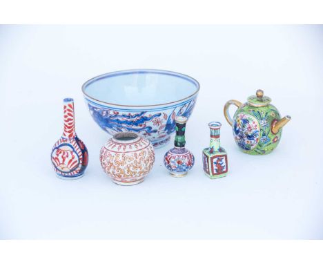 A small collection of European decorated 18th century Chinese porcelain, comprising a miniature teapot and cover, decorated w