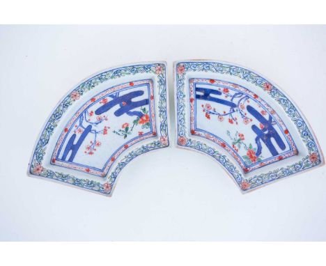 A pair of hors d'oeurve dishes, probably late 19th century, enamelled and gilt and in underglaze blue in the Japanese style, 
