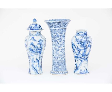 Three Chinese Kangxi period vases, early 18th century, one with a flared rim above a petal moulded neck and base, the body wi