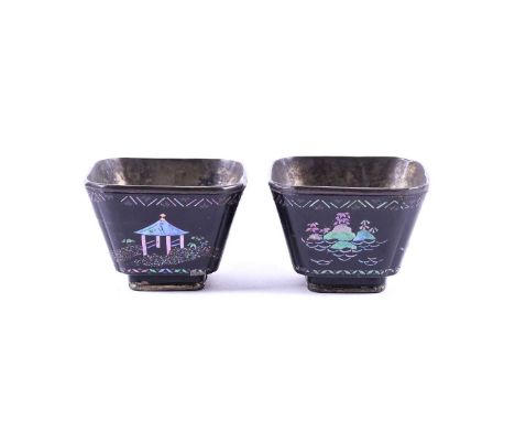 A close pair of Chinese Lac Burgaute square tea bowls, 18th century, of square tapering form with canted corners on raised sq