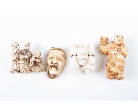 Four Japanese carved ivory netsuke, Meiji, comprising an actor holding an oni mask whilst a young boy clambers up him, inset 