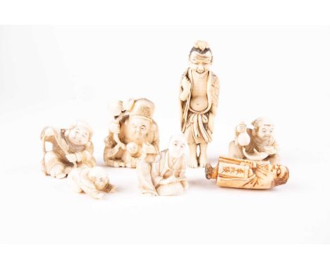 A group of Japanese netsuke, Meiji/Taisho period, comprising Ebisu (signed), Daikoku and Jurojin, an actor with a fan (signed