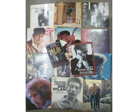 A collection of fourteen Bob Dylan LP records and a Bob Dylan book and magazine, records include Highway 61 Revisited, The Fr