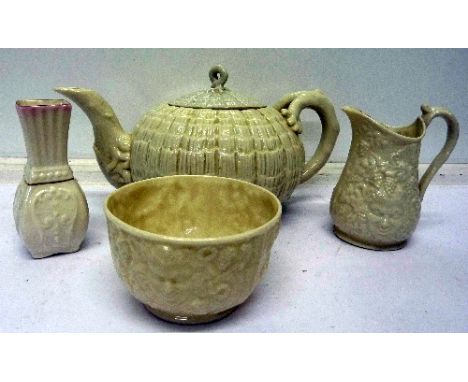 A Belleek tea service and a vase, jug cracked