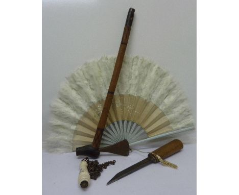 A chain pull, an axe, a tool and a fan