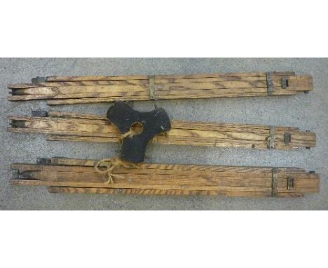 A wooden tripod camera base/stand