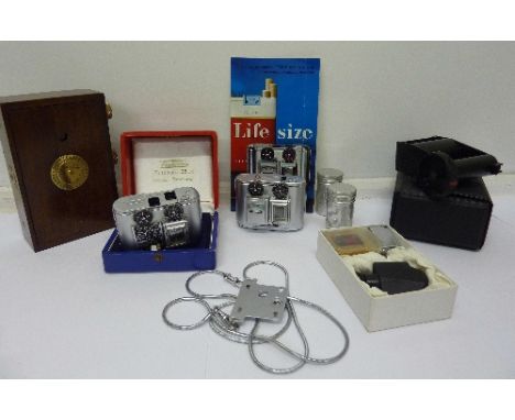 Two miniature 35mm Tessina cameras and a Zero 2000 pinhole camera