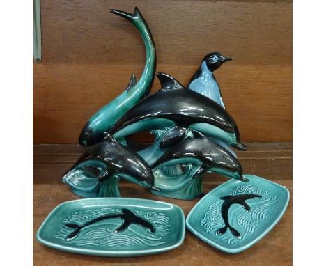 Six pieces of Poole pottery and a model fish, one dolphin a/f