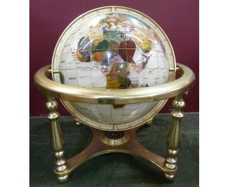 A gemstone globe on a brass base, diameter of frame 30cm