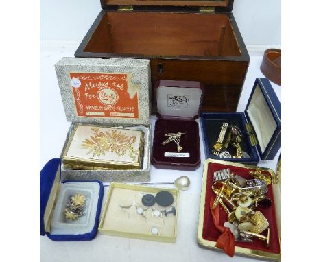 A musical compact, cufflinks, buttons, etc.