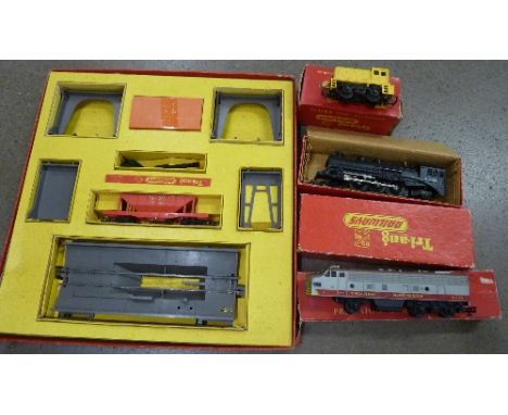 A Tri-ang operating hopper car set, a diesel locomotive and a Pacific steam locomotive 4-6-2, boxed