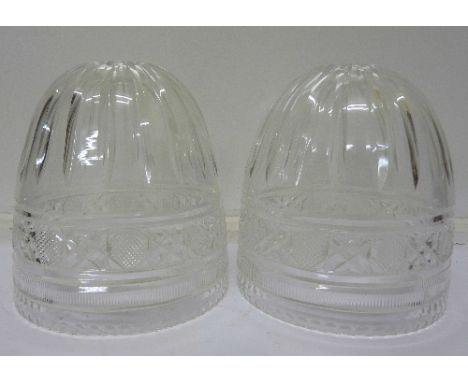 A pair of cut glass light shades