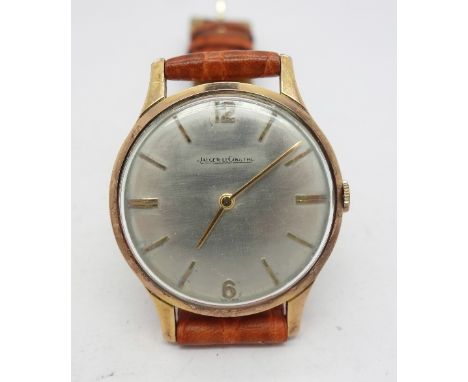 A gentleman's gold plated Jaeger-LeCoultre wristwatch on a leather strap