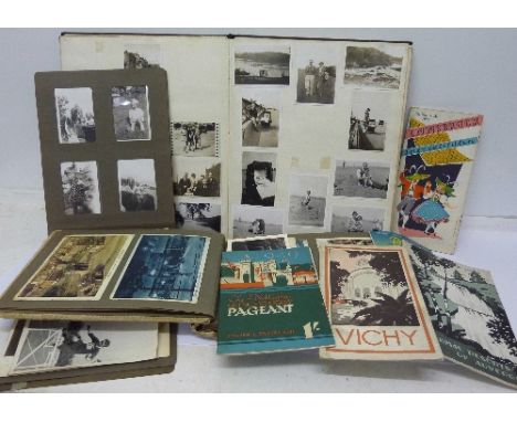 A collection of 20th Century photographs including WWII period, tourist pamphlets and a City of Nottingham Quincentenary Page
