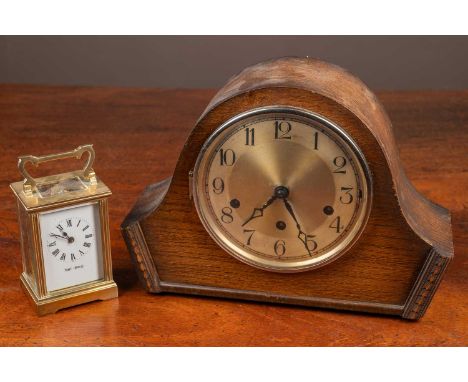 Two mantle clocks consisting of a carriage timepiece, the enamelled dial signed Mappin &amp; Webb together with an oak cased 