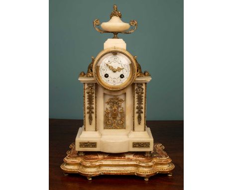 An antique French alabaster mantel clock, the count wheel strike on a bell, all on a gilt metal stand41.5cm high overallThe c