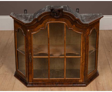 With glazed door and shaped shelf within.70cm wide x 26cm deep x 64cm highMarks, dents and scratches due to use. Losses to th