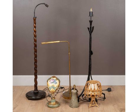 To include a standard lamp with a barley twist support and an angled fitting; a metal tripod standard lamp; a brass standard 