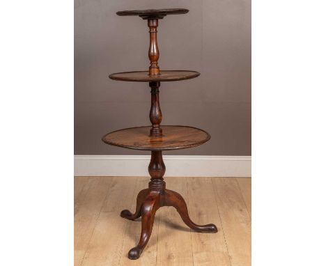 With turned column supports and tripod base. The lowest tier 62cm diameter x 127cm high overallMinor marks, dents and scratch