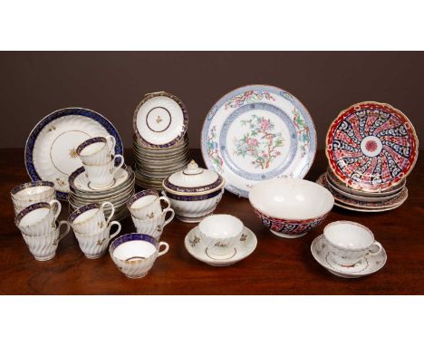 To include a part tea service of twisting fluted form with blue borders and gilt highlighting. The part tea service consistin