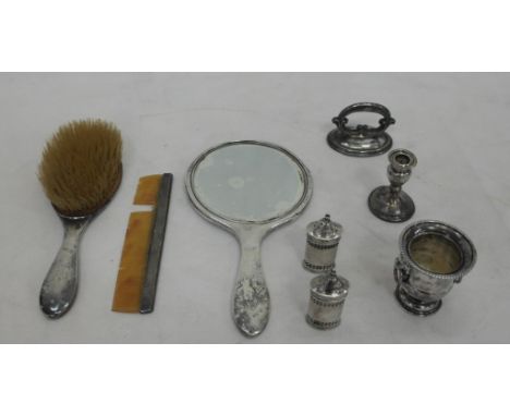 A HM silver squat candlestick; together with pepperettes, ,mirror brush, comb and EPNS items