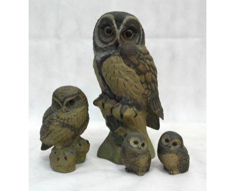 A set of four stoneware Poole Pottery owls