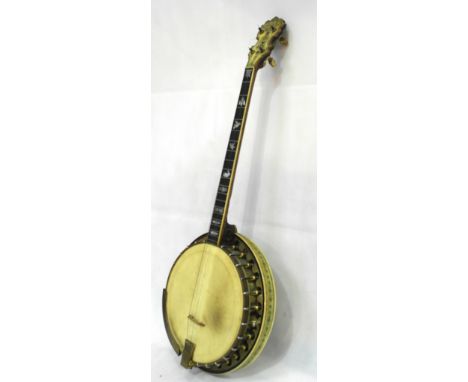 A Stromberg 'Deluxe' banjo, Boston, Mass, c1930 : celluloid model with rosewood neck with carved heel.   Intricate inlay with