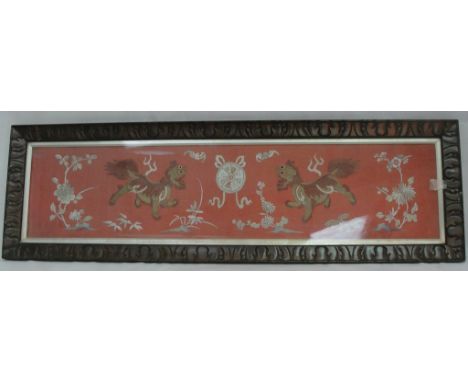 A Chinese silk tapestry depicting Dogs of Fo