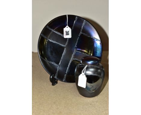 TWO PIECES OF MODERN POOLE POTTERY FROM THE ALCHEMY RANGE, comprising a plate, diameter 21cm and a ginger jar and cover, heig