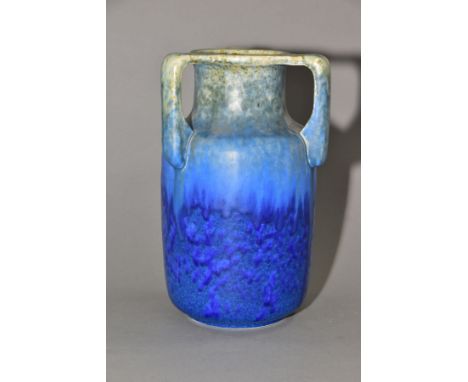 RUSKIN POTTERY, a three handled bottle shaped vase, mottled green fading to blue glaze, inscribed W. Howson Taylor and impres