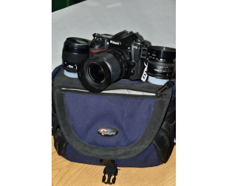 A NIKON D300S DIGITAL SLR CAMERA fitted with a Nikkor AF-S DX 18-55mm f3.5, a Nikkor AF 35-80mm f4 lens, a Nikkor AF 50mm f1.