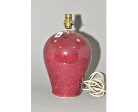 A DARTINGTON POTTERY TABLE LAMP, of baluster form, with a high fired speckled blue and sang de boeuf glaze, impressed seal ma