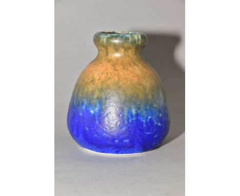 RUSKIN POTTERY, a rounded conical vase, banded with green, orange and blue glazes, impressed Ruskin England 1933 to the base,