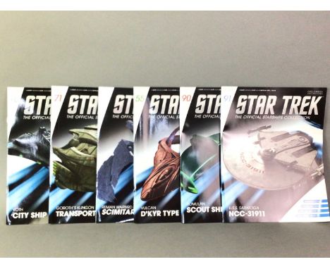 COLLECTION OF STAR TREK COLLECTORS MAGAZINES, BY EAGLEMOSS with information and characteristics along with plastic Star Trek 