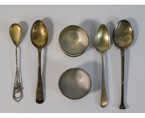 Four silver spoons including a seal spoon &amp; two silver napkin rings, 103.2g