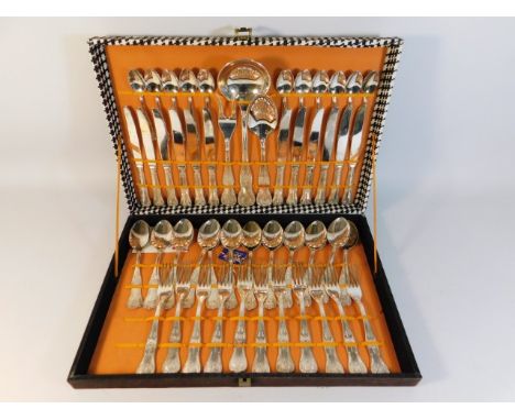 A boxed twelve setting of Italian Kings pattern cutlery, lacking one fork