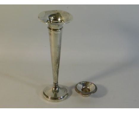 A 1944 Birmingham silver posy vase by E. J. Houlston twinned with a silver candle sconce, vase is 9.25in tall