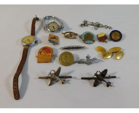 Two silver spitfire brooches, an RAF sweetheart badge, a Winnie The Pooh badge &amp; other items