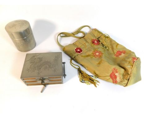 A Chinese pewter tobacco caddy &amp; cigarette box twinned with an Oriental silk purse