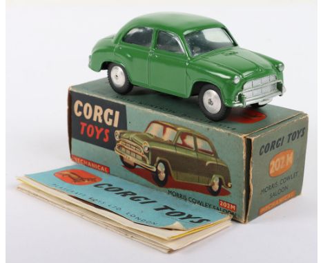 Corgi Toys 202M Mechanical Morris Cowley Saloon, green body, silver trim, flat spun wheels, in mint original condition, with 