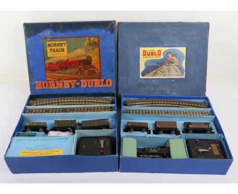 Hornby Dublo two boxed EDG7 Tank Goods sets, 0-6-2 GWR tank engine 6699 green livery, three wagons track and transformer, box