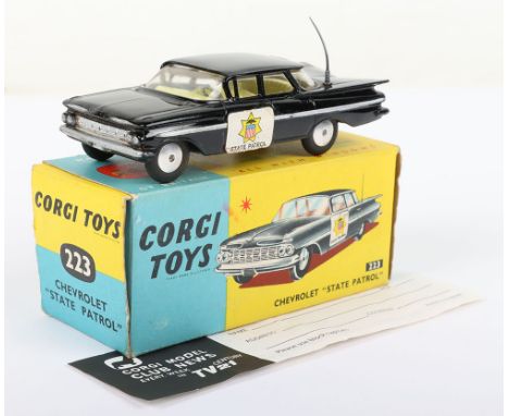 Vintage Corgi Toys 223 Chevrolet State Patrol black body, lemon interior, aerial, flat spun wheel hubs, paper labels, in near