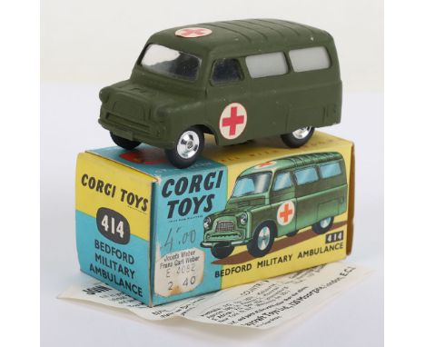 Vintage Corgi Toys 414 Bedford Military Ambulance, military green, scarce shaped spun wheels, red cross labels, in near mint 